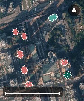 屯門市廣場航空影像，8 座樓宇輪廓按風水評分上色，綠色分高、紅色分低
