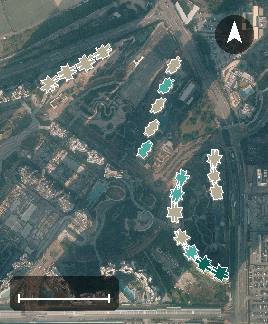 日出康城－首都、領都、領峰、領凱、緻藍天航空影像，19 座樓宇輪廓按風水評分上色，綠色分高、紅色分低