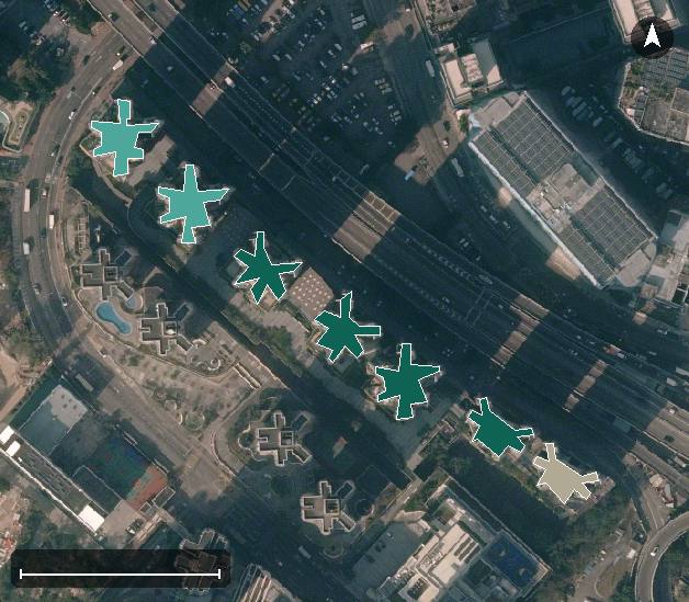 環宇海灣航空影像，7 座樓宇輪廓按風水評分上色，綠色分高、紅色分低